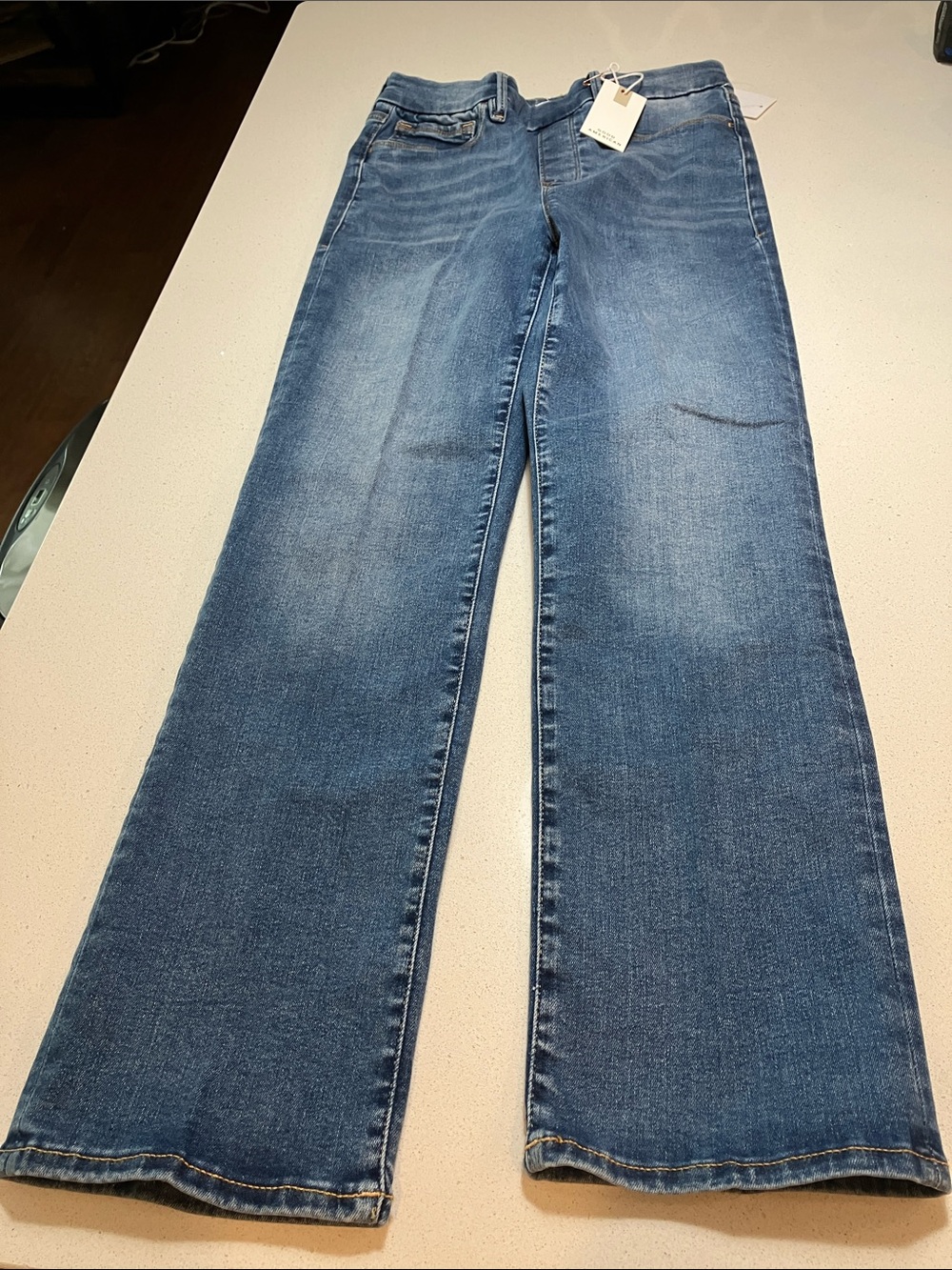 Good American pull on straight leg Jeans in Medium Blue Wash